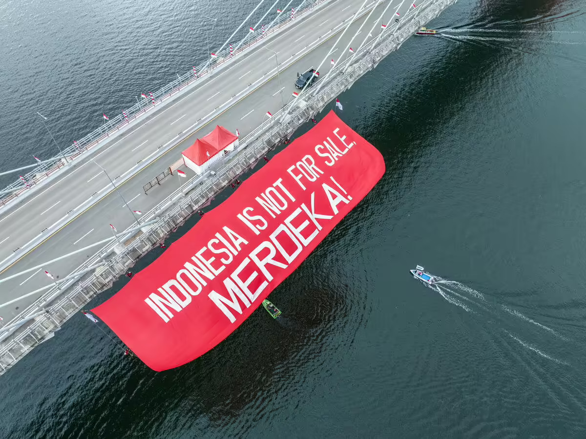 Aksi organisasi masyarakat sipil dan warga di Penajam Paser Utara menggelar serangkaian kegiatan memperingati HUT RI tak jauh dari Ibu Kota Nusantara. (Greenpeace Indonesia)